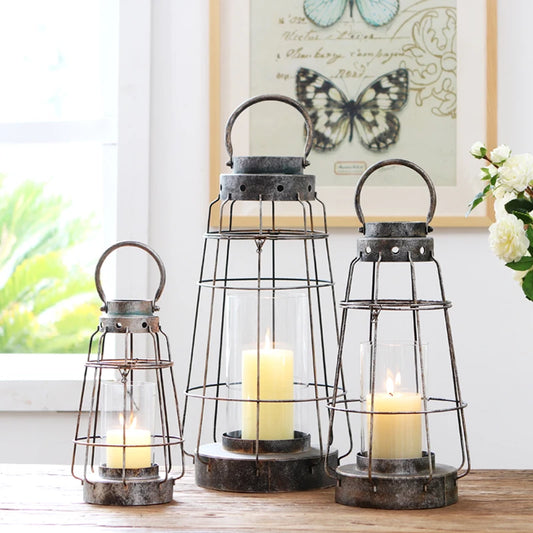 Portable metal and ironwork candle holder